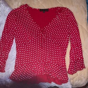 red polka dot shirt